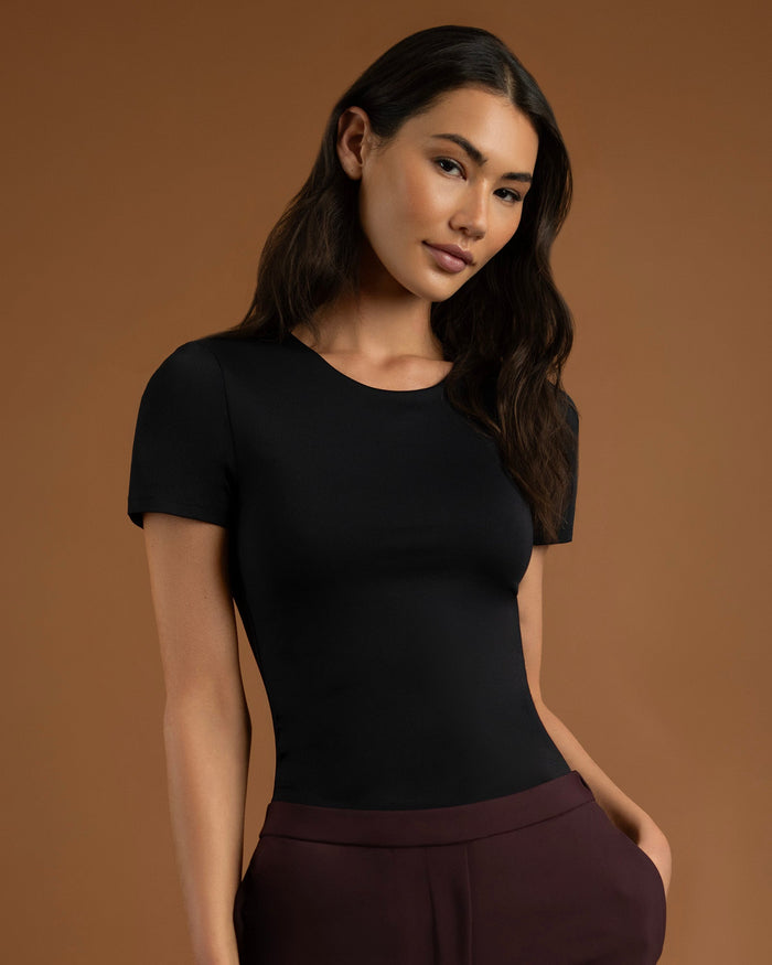 Woman wearing the Double-Layered Short Sleeve Top in Black, front view